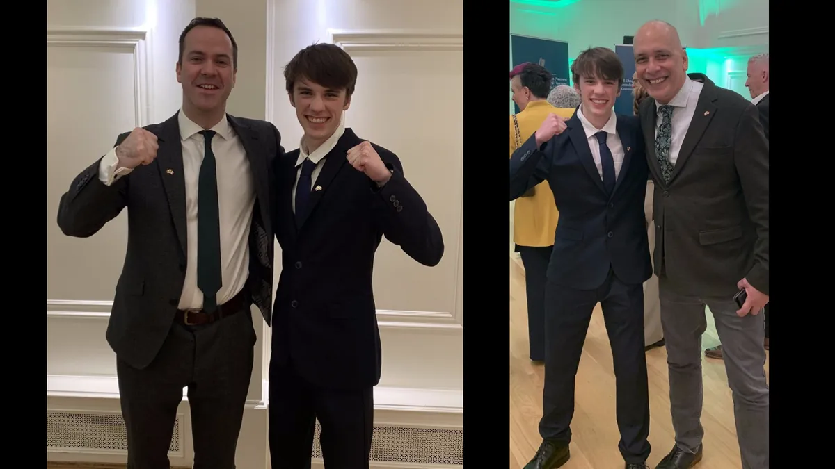 Gabriel poses with an Irish government official and Councillor Pete Fry, raising his fists in both reception portraits.